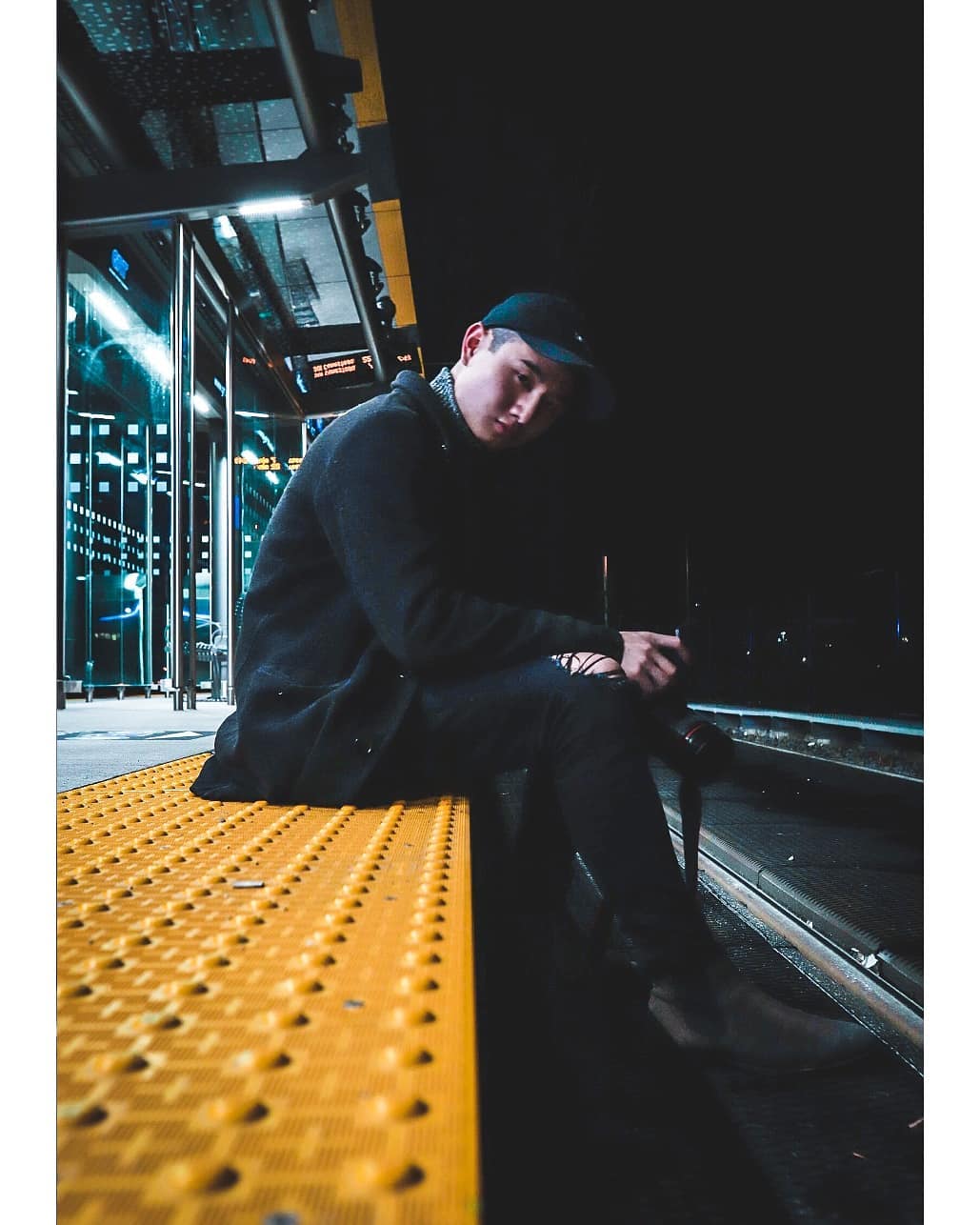 Nighttime portrait on a train platform